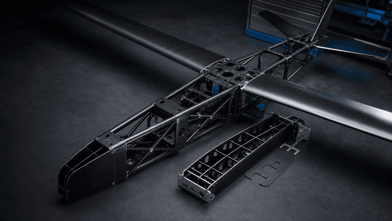 Carbon fiber UAV frame with tubes, structural plates and machined mounting interfaces